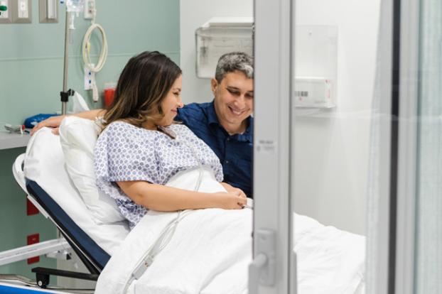 Couple in room before surgery